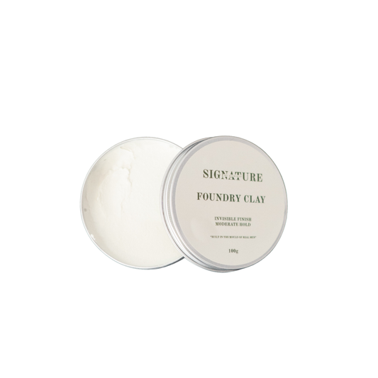 Two containers of Signature Foundry Clay on a white background